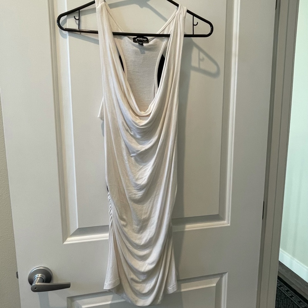 NWOT Bebe Ruched dress White with a cute Lacey black bow on the back